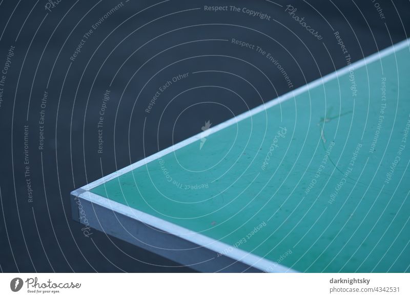 Corner of a table tennis table in green with white border on a schoolyard Break Schoolyard Detail Sporting event Deserted Ball sports Colour photo shutdown