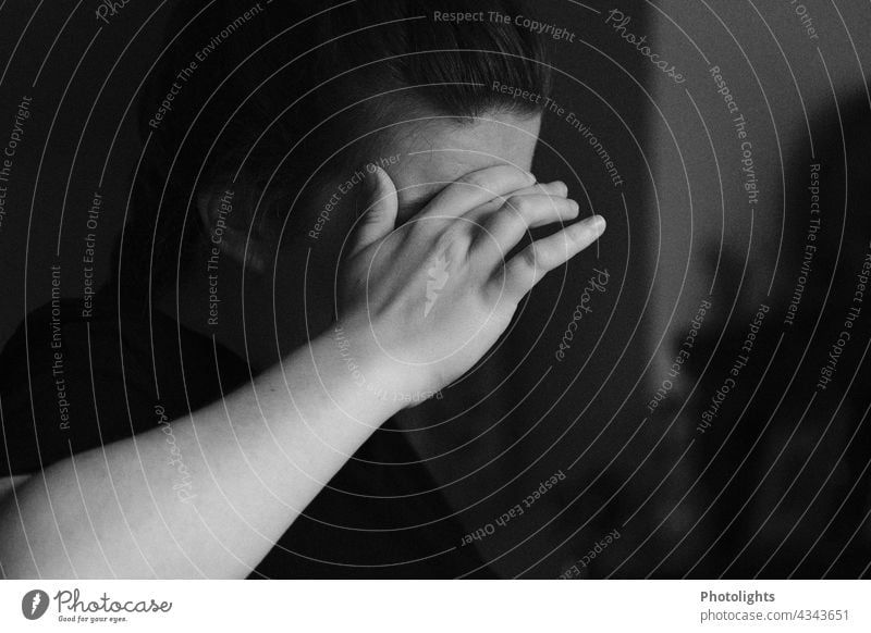 Young woman covers her face with her hand Face Hand Fingers Concealed Protective Defensiveness Black & white photo arm White rabid Anger Emotions Woman