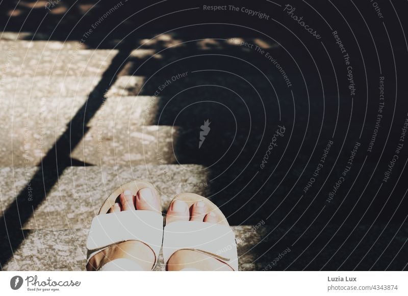 Summertime, out and about in the city or feet in white sandals on a staircase with lots of light and lots of shadow sunshine Sunlight Shadow Stairs stagger