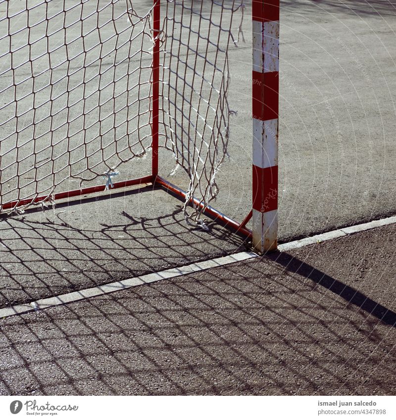 old abandoned street soccer goal football sports equipment shadow silhouette ground field court soccer field playing park playground outdoors bilbao spain