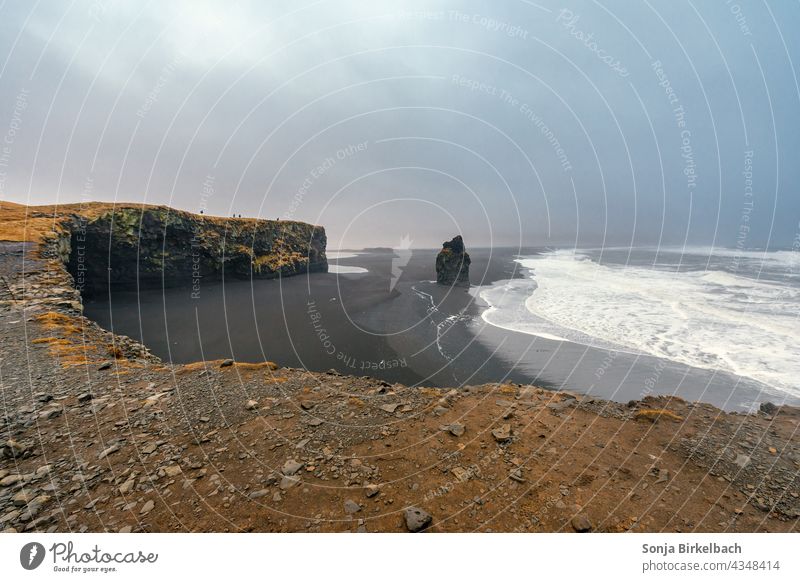 Reynisfjara - black beach in the south of Iceland Beach Black Sand Icelandic South Iceland cliffs rock Ocean Waves Nature Landscape Sky Clouds Dramatic Weather