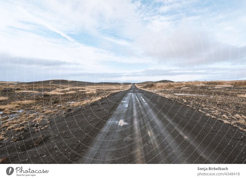 Gravel road in Iceland Icelandic Ski piste gravel road Street Mud Landscape Horizon wide Plain Nature Exterior shot Vacation & Travel Colour photo Deserted