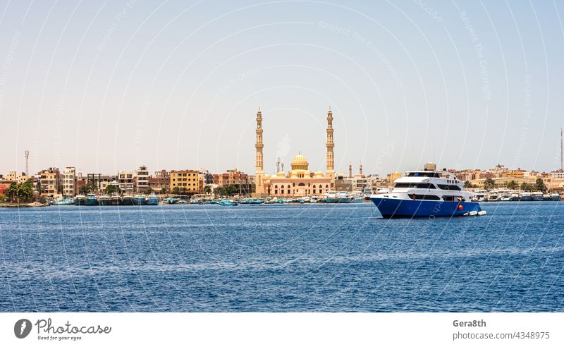 many ships in the Hkrgada Marina in the Red Sea Africa Hurghada Hurghada Marina bay beach blue blue sky blue water boat boat trip boats boats tied coast