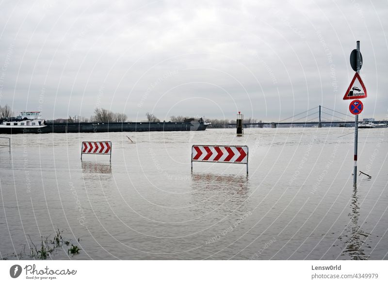 Extreme weather: Flooded parking lot in Düsseldorf, Germany climate climate change disaster düsseldorf extreme weather flood flooded street global warming