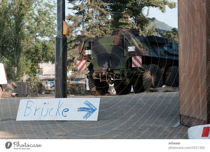 Bundeswehr vehicle and sign on temporary bridge Bridge Signs and labeling makeshift Federal armed forces Street flood disaster