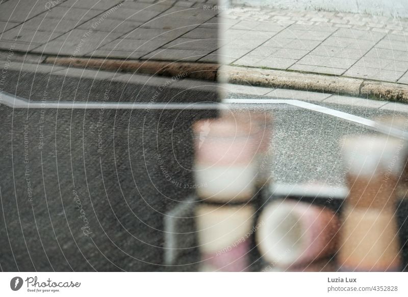 Sidewalk and road markings reflected in the window pane of an extortion bar Street Lane markings Traffic lane Café reflection Delicate Town urban Bright