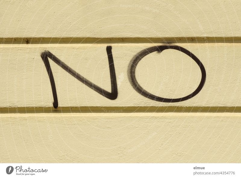 NO is written in black on a bright wall / rejection / nitric oxide No no Wall (building) Graffito Graffiti Daub Vandalism Nitric Oxide Formula No vote Denial