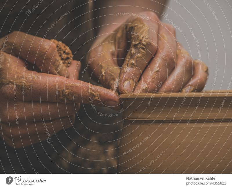 Closeup of hands making pottery on the wheel Do pottery Craft (trade) creatively Tone Pottery hobby Craftsman Workshop work Artisan Threshing disc closeup