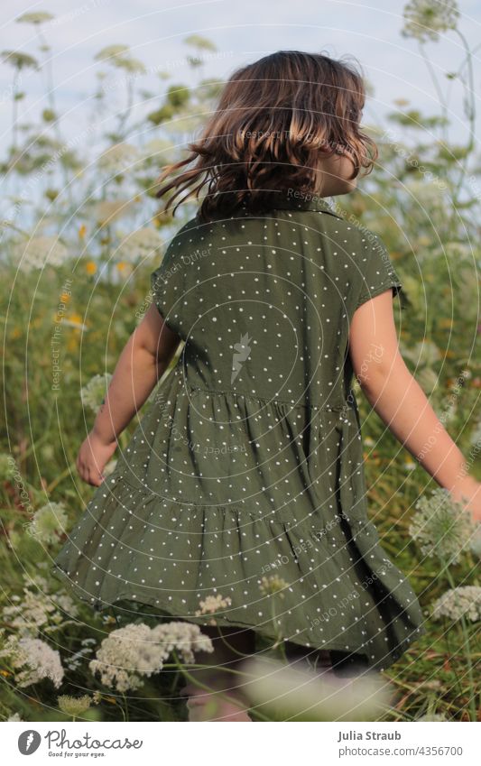 girl turns in flower field Flower field Flower meadow Girl pretty swift Rotate Dance Summer Sun flowers Wild carrot blossom Green Nature Rhön being out