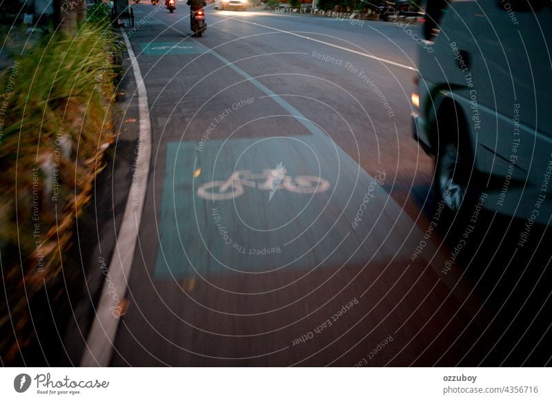 Bicycle road sign on asphalt bicycle lane paint transportation bike symbol city travel path safety traffic route urban white street direction ride way wheel