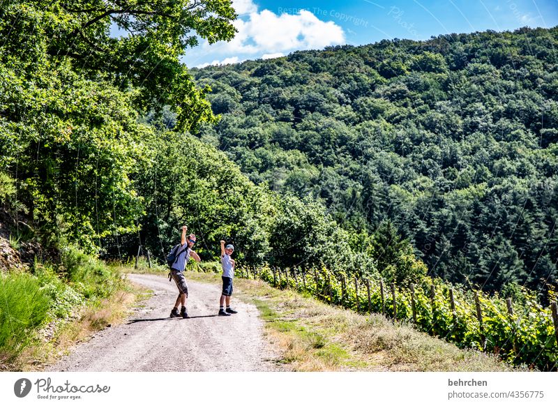 superheroes Happy Happiness Joy Lanes & trails hikers Together in common Environment Exterior shot Nature Summer Son Father Hiking Boy (child) Man Child Parents