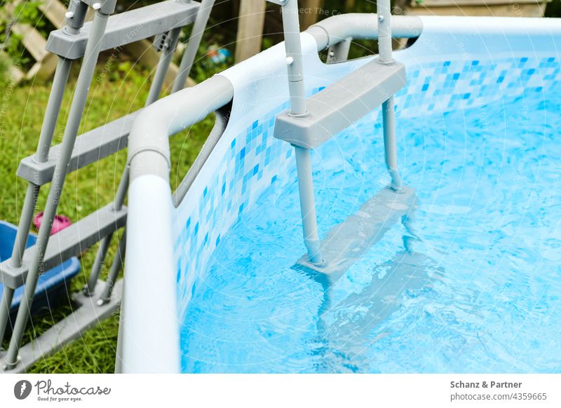 Pool ladder swimming pool be afloat Garden Summer ardor Ladder Water Blue Swimming & Bathing Refreshment Vacation & Travel Exterior shot Colour photo