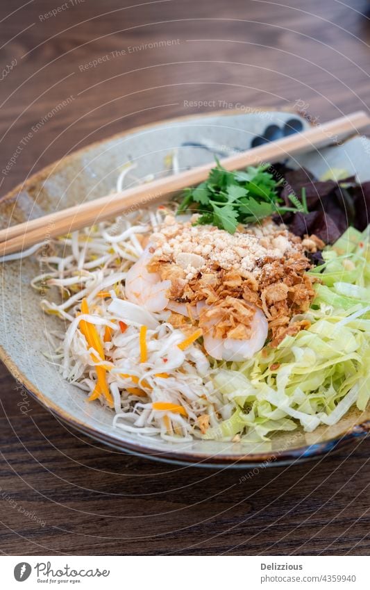 Side view of a bowl of Vietnamese shrimp rice noodle salad with chopsticks Salad Shrimps Food Healthy no people Chopstick Seafood Bowl Raw Eating Chinese Dinner