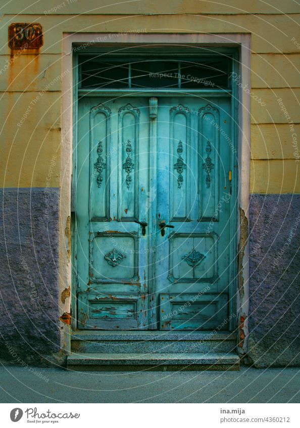 Turquoise door and yellow facade of an old house House (Residential Structure) Old Old building Blue nostalgically Nostalgia Facade Town Urban building Old town