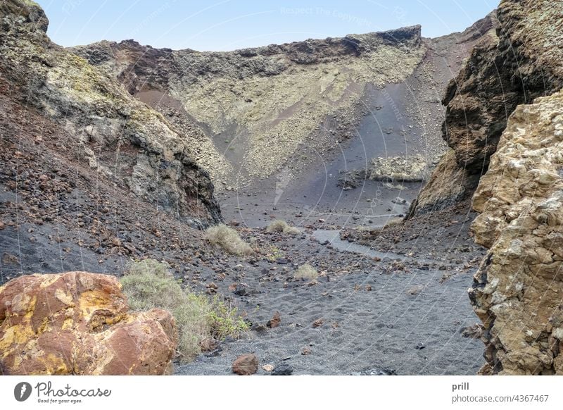 Timanfaya National Park Caldera de los Cuervos lanzarote spain island volcanic canary islands volcanic soil volcanism rock formation stone boulder arid geologic