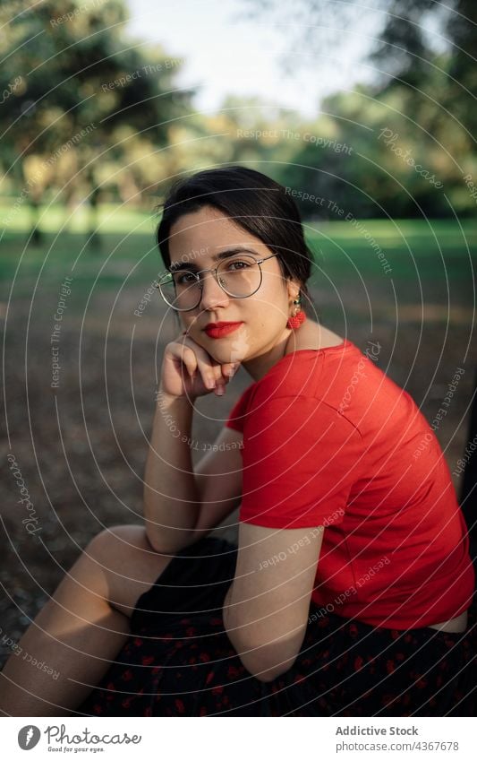 Serene woman chilling on lawn in park summer serene harmony sunset peaceful meadow enjoy female grass nature field sit calm tranquil carefree freedom