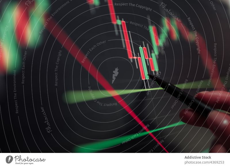 Crop trader working with financial charts on computer screen binary option broker display graphic professional point statistic analysis analyze electronic