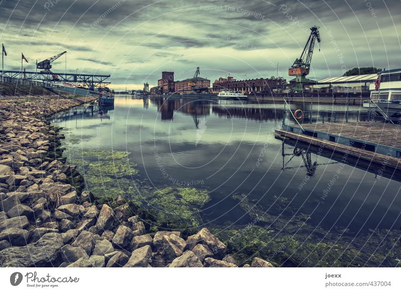 low tide Water Sky Clouds Horizon Beautiful weather River bank Industrial plant Inland navigation Harbour Old Hideous Brown Green Orange rhine harbour Crane