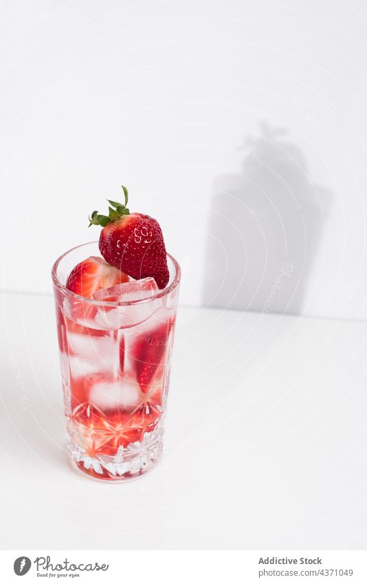 Detox drink with fresh strawberry infuse water detox cold glass summer beverage natural refreshment delicious tasty minimal simple vitamin healthy liquid serve