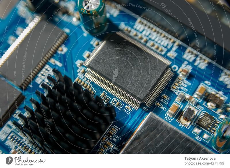 Microcircuit with chip close up electronic computer technology hardware microchip motherboard processor shortage semiconductor microprocessor component