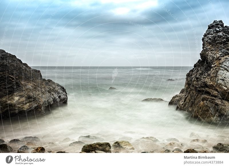 Rock in the ocean at Big Sur, California. Long exposure california big rock pfeiffer landscape travel arch beach nature vacation sea tourism water sky beautiful