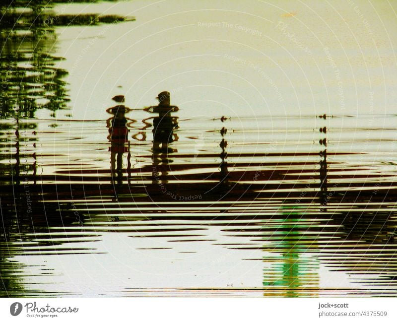 We love water in the carp pond Romance Love Lovers Stick figure Surrealism Surface of water Neutral Background Structures and shapes Silhouette Reflection