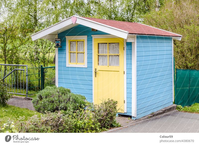 Garden Shed or Tool Shed shed storage house outdoor wooden country design farm backyard exterior building architecture structure home garden grass store blue