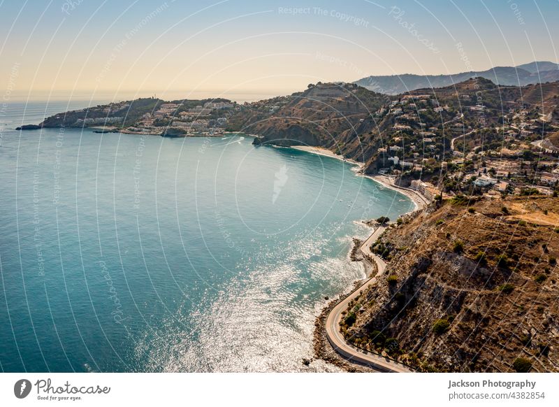 Aerial view of touristic coast in Almunecar, Andalusia, Spain spain almunecar beach urban andalusia mountain coastal day andalucia ocean seascape architecture