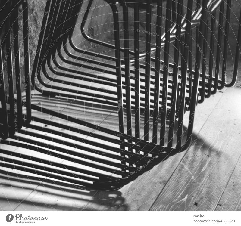 Pews Seating chairs Abstract Mysterious interior Closed Empty Many Light Shadow Contrast Detail Interior shot Together detailed view Unclear puzzling Metal