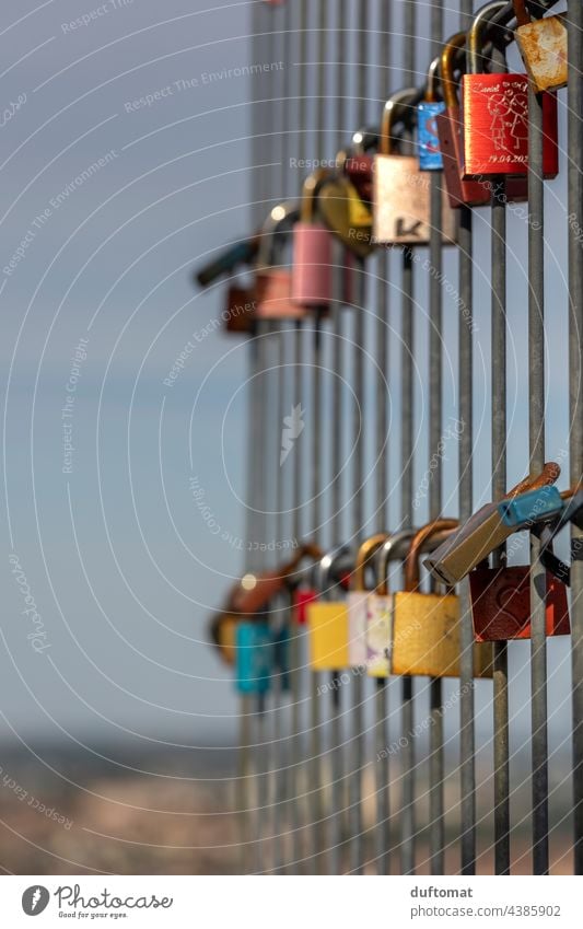 Love locks on fence Love padlock Love Locks Fence Grating panorama Vantage point Exterior shot Romance Infatuation Loyalty Emotions Metal Relationship Padlock