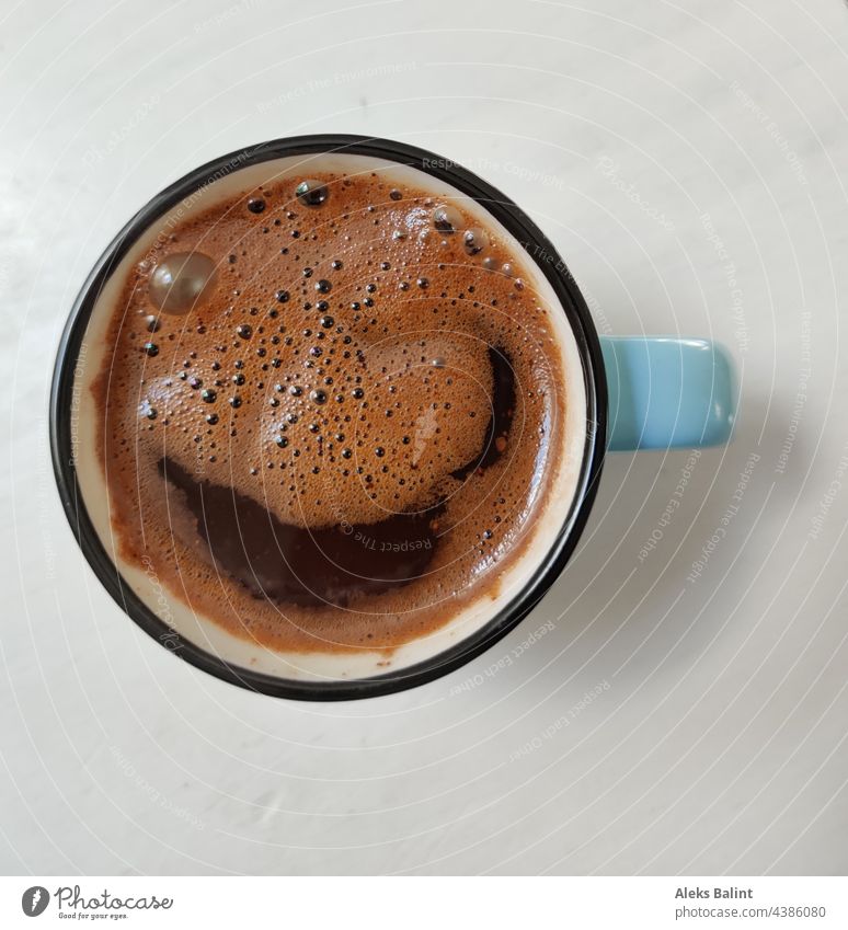 A cup of coffee from above Cup Coffee Coffee cup Interior shot Hot drink Mocha from on high Beverage Delicious To have a coffee Coffee break Colour photo