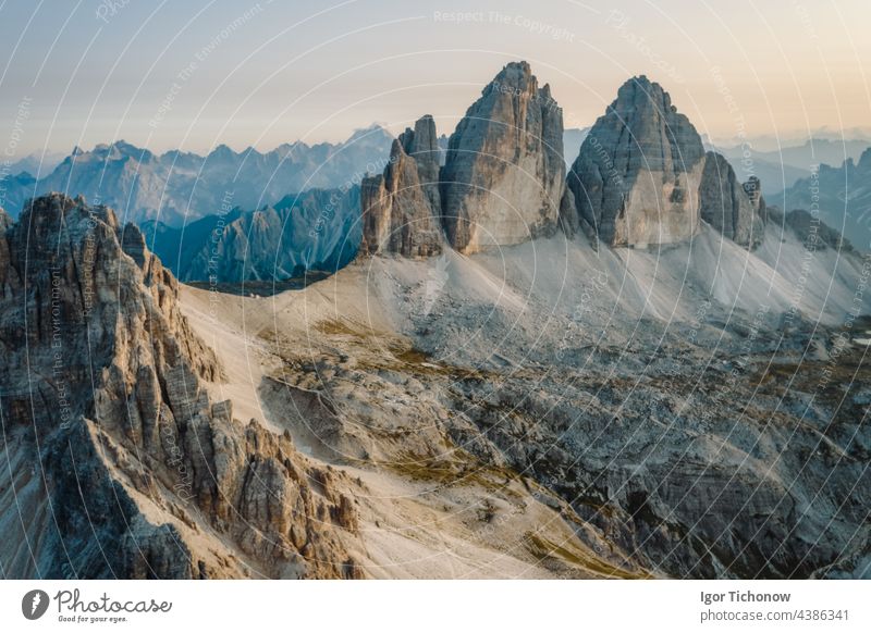 Epic aerial view of Tre Cime di Lavaredo during sunset, Dolomites, Italy lavaredo cime tre dolomites tre cime di lavaredo travel tourism tirol tyrol south tyrol