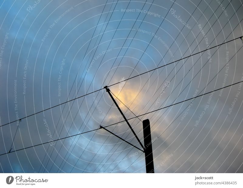 Last light of the day on the lines Sky Clouds evening mood blue hour High voltage power line Electricity Electricity pylon Overhead line