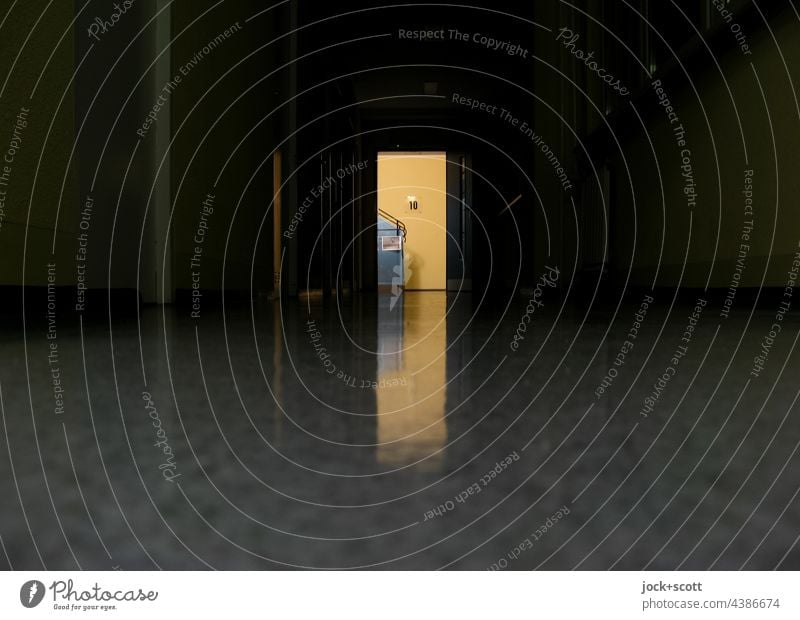 Bright glow shows the way to the staircase Corridor Architecture Artificial light Ground Reflection Dark Neutral Background Lighting Low-key Silhouette Contrast