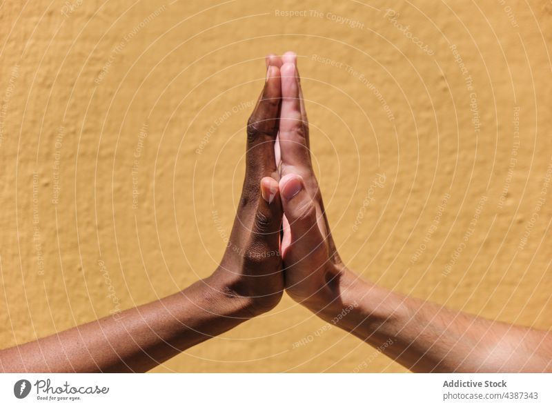 Multiracial friends giving high five hand together gesture diverse greeting unity success concept multiethnic multiracial black friendship people support