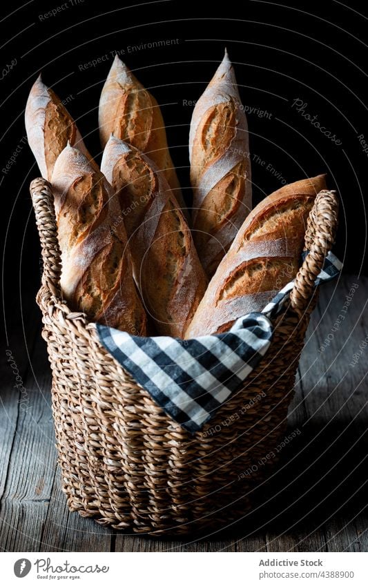 Freshly baked baguettes in basket bread fresh food french wheat healthy bakery grain organic delicious traditional flour rye tasty breakfast natural whole