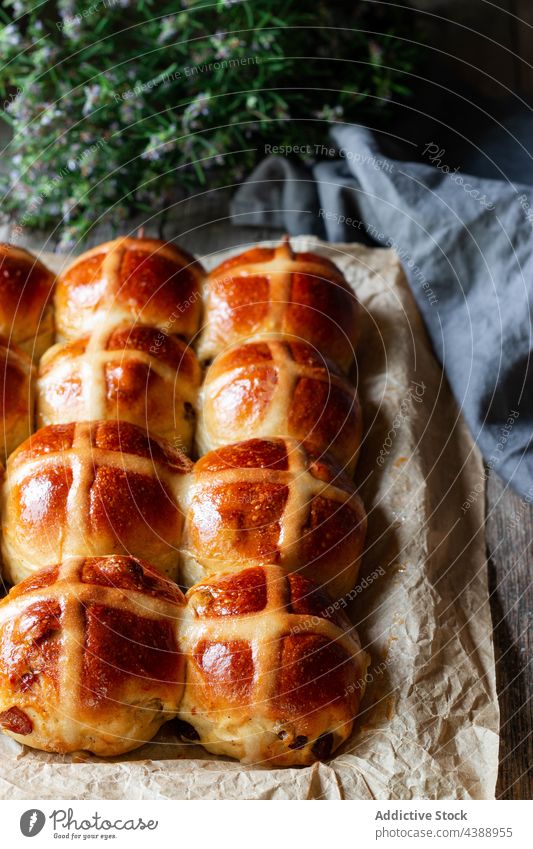 hot cross buns on baking tray glaze fresh puff food wheat baked soft grain flour baker bakery cereal organic breakfast dessert pastry sweet delicious tasty