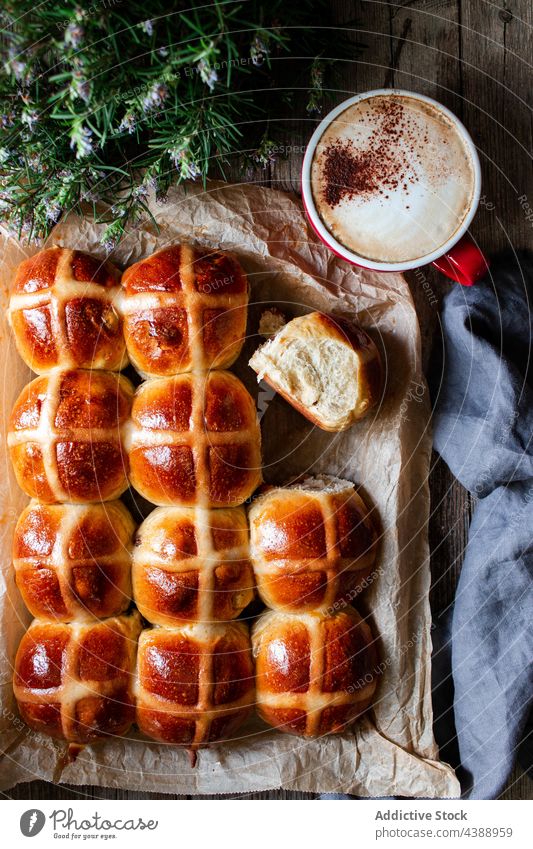 hot cross buns on baking tray glaze fresh puff food wheat baked soft grain flour baker bakery cereal organic breakfast dessert pastry sweet delicious tasty