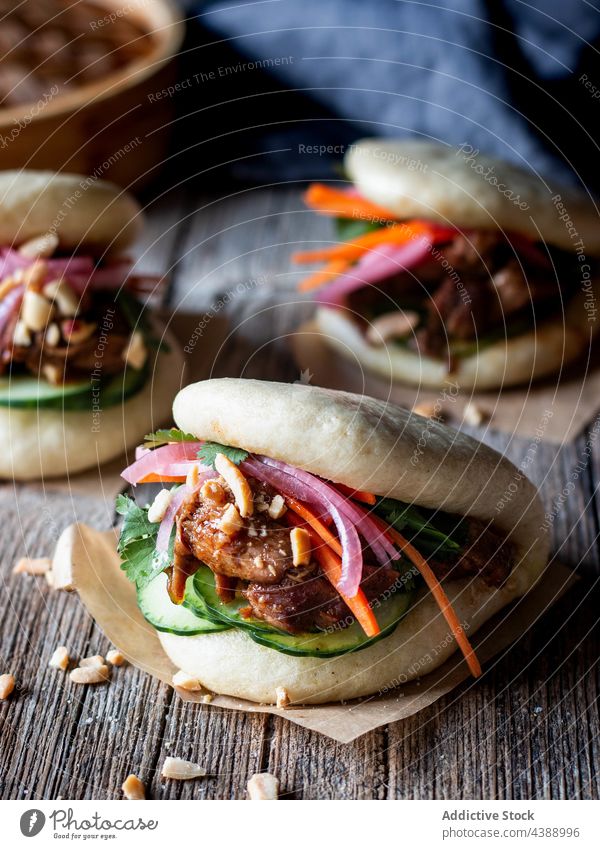 Bao buns with vegetables and meat food unhealthy cake wheat lush fresh juicy bao buns harmful lozenge meal burger delicious sandwich beef snack lunch dinner