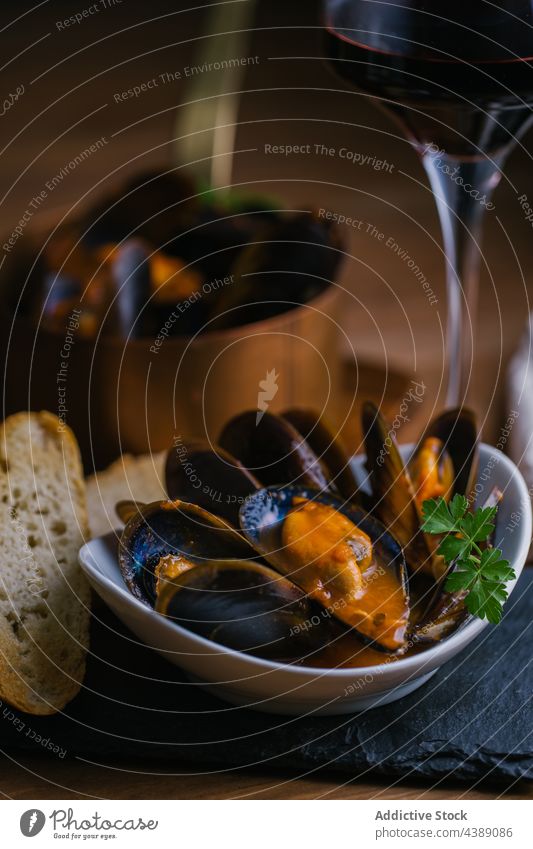 Steamed Mussels mussels bowl herbs cooking kitchen mollusk plate seafood lunch gourmet dish shellfish meal restaurant clam cuisine delicious tasty yummy