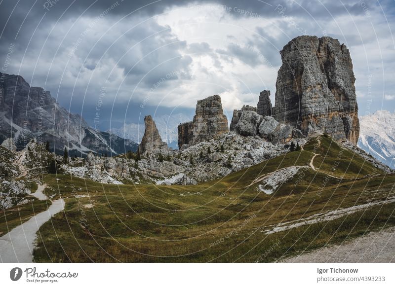 Hiking trail in Cinque Torri Dolomites on summer day. Italy dolomites cinque torri sky blue mountain landscape italy travel hiking nature peak rock alps europe