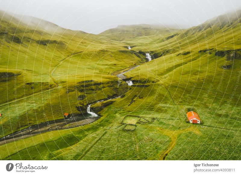 Beautiful aerial drone view of Icelandic landscape with green fields and river in summertime iceland icelandic erosion journey volcano trip aerial view plane