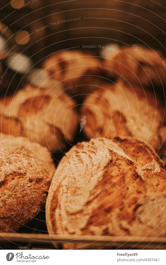 Artisan bread piled up on a bakery artisan group fresh food french flour whole meal breakfast loaf gourmet organic background wood homemade wheat agriculture