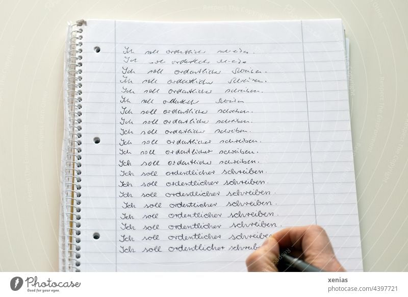 "I should write more neatly" writes a hand on paper with lines writing Handwriting Write Text pen tutorial Lined Paper words Writing Exercise Characters