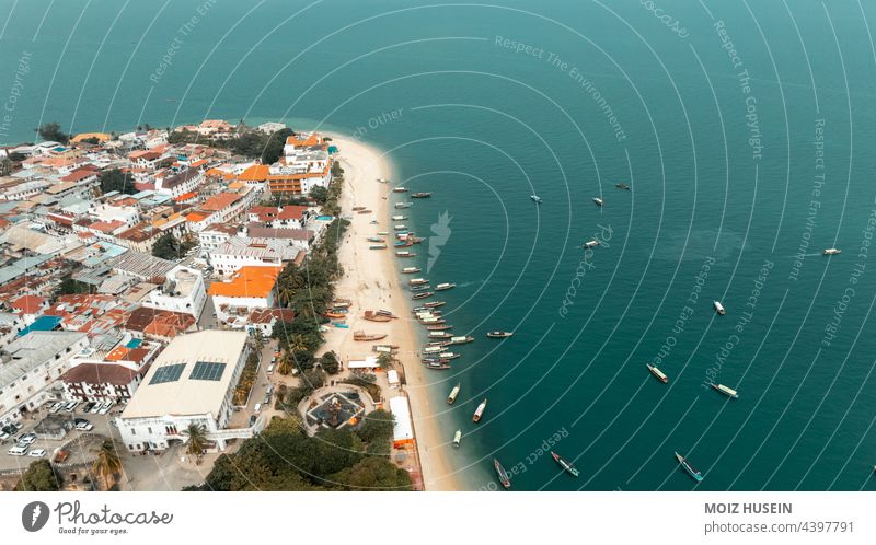 Aerial view of Zanzibar island aerial africa architecture beach building buildings city skyline city street cityscape coast coastline drone historical history