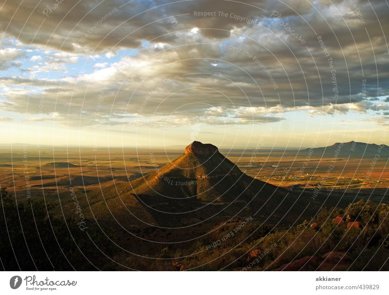 vast country Environment Nature Landscape Sky Clouds Rock Mountain Peak Tall Natural Far-off places Colour photo Subdued colour Multicoloured Exterior shot