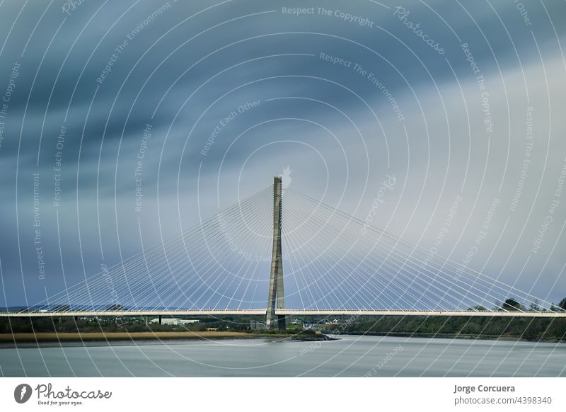 suspension bridge from the Waterford Highway to Kilkeny. Ireland. long exposure with cloudy day. angle architecture blue building exterior built structure cable