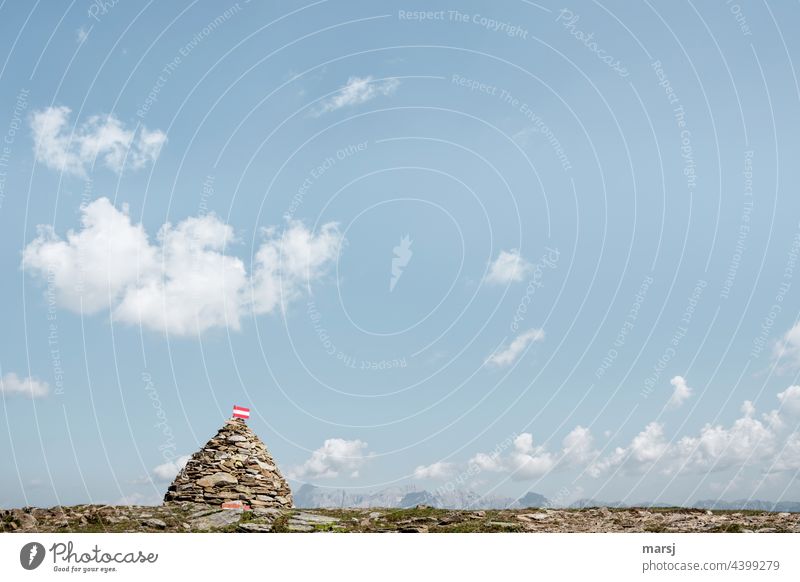 Cairn with hiking trail markings. In the background the Dachstein group Panorama (View) Alps Nature Peak Clue Hiking Mountain Vacation & Travel Pile of stones