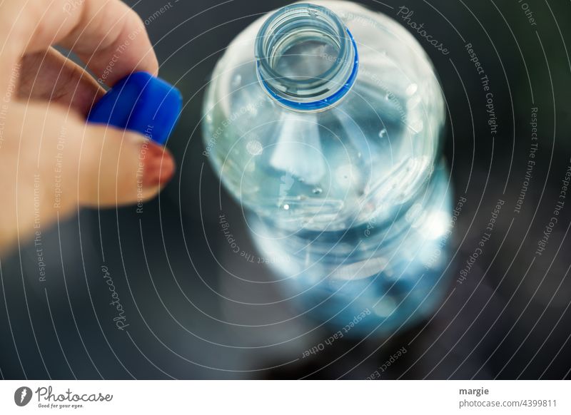 one hand opens a water bottle Water Blue Drops of water Bottle Close-up H2O Macro (Extreme close-up) Wet Detail Bottle of water Near Damp Deserted Reflection