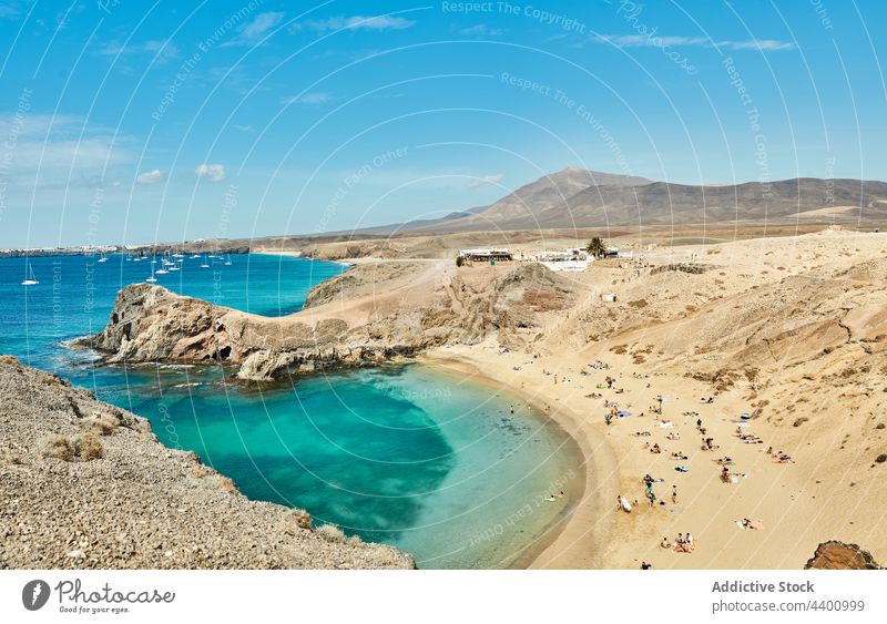 Sandy beach near turquoise sea summer resort water seashore sand tourist paradise rest fuerteventura spain canary islands seaside ocean vacation coast tourism